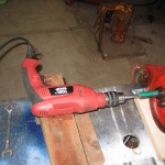 Drill attached to reel mower